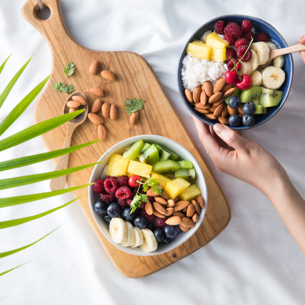 Bowls of fresh fruit and almonds