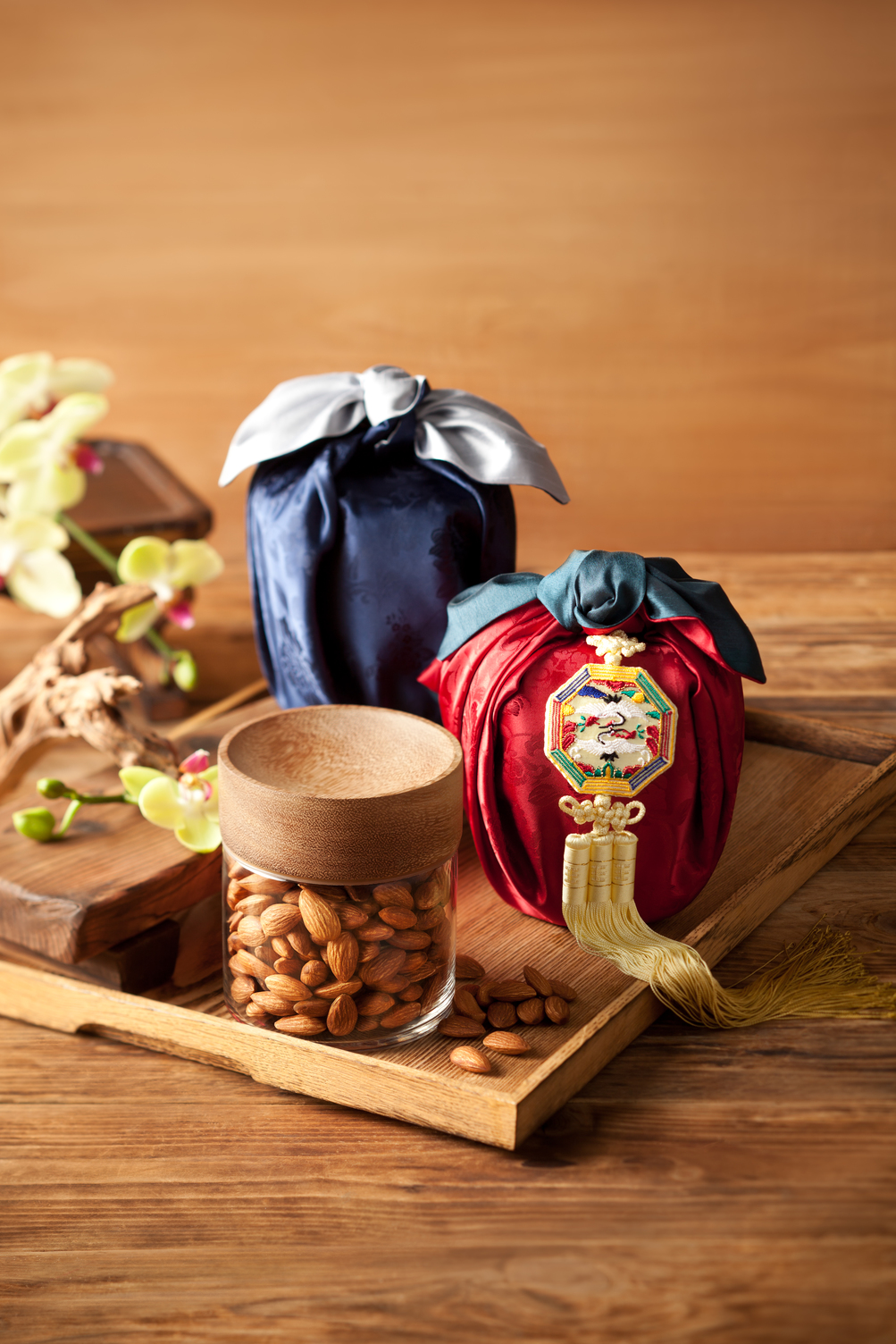 Decorative almond gift set with glass jar and silk-wrapped packages