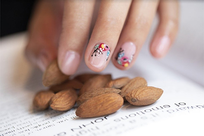 Almonds with hand